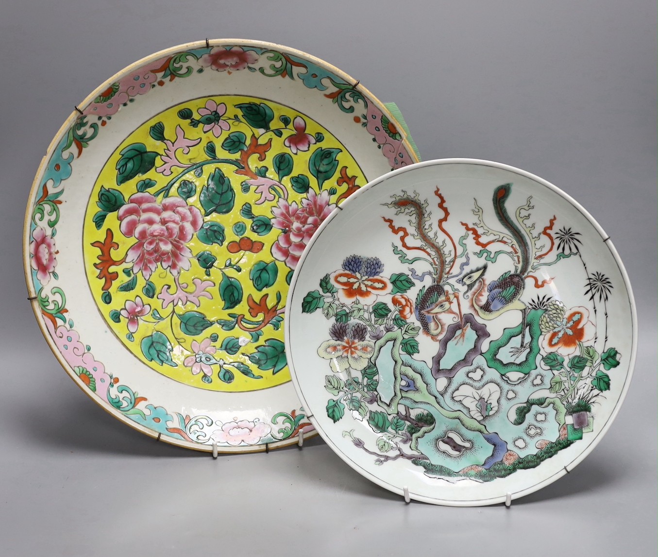 An early 20th century Chinese famille rose charger (a.f) and a Chinese famille verte dish. Largest 36cm